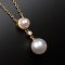 梦克拉 18K金群镶钻石海水珍珠吊坠女 高亮泽正圆 双飞翼