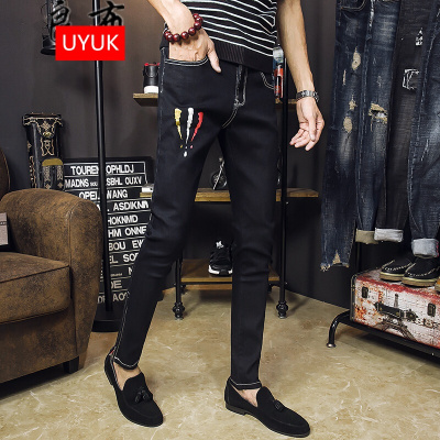 UYUK秋冬新款泼墨牛仔裤男修身小脚学生韩版潮流个性弹力百搭裤子黑色